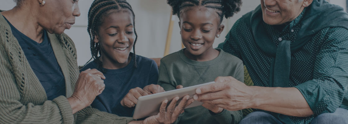 African American family using smart home app